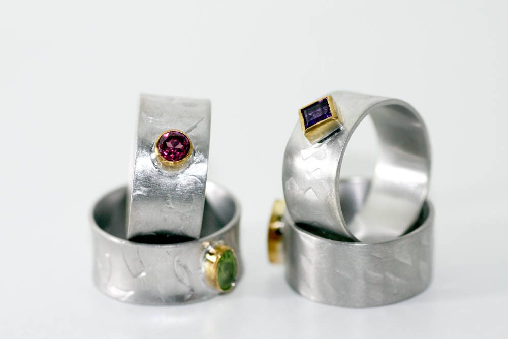 Peridot on Silver ring with gold K14 bezel