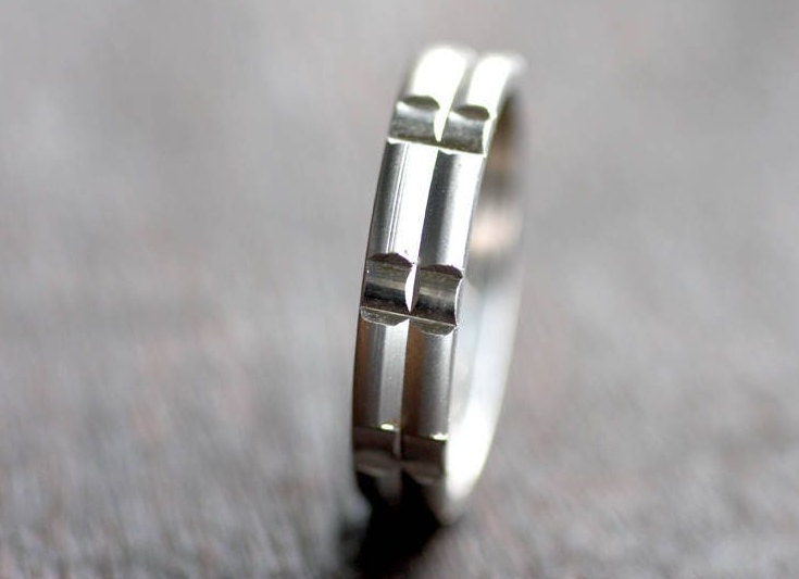 Solid gold or sterling silver wedding ring with simple lines