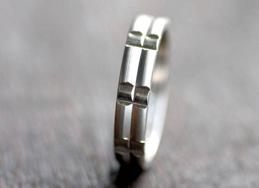 Solid gold or sterling silver wedding ring with simple lines