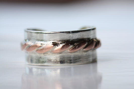 Silver adjustable ring with copper braid