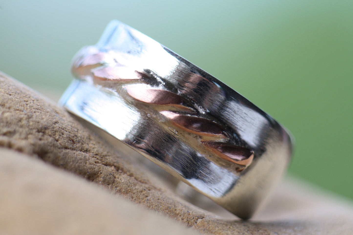 Adjustable silver ring with copper braid
