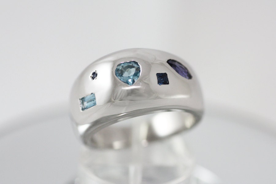 Silver ring with Iolites, Aquamarines and Sapphires