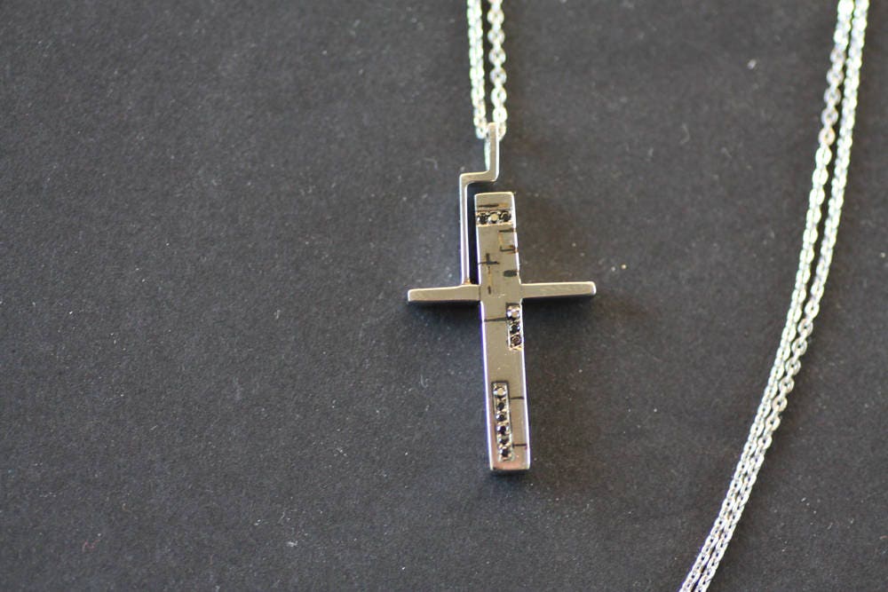 Solid gold Cross with Black diamonds