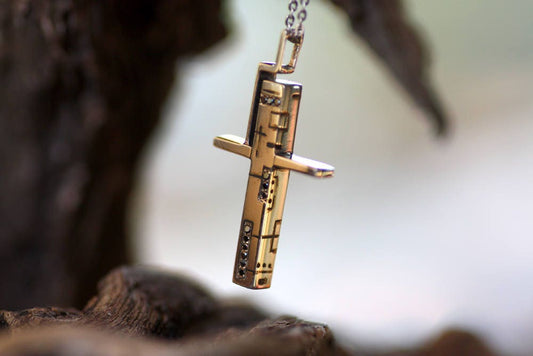 Solid gold Cross with Black diamonds