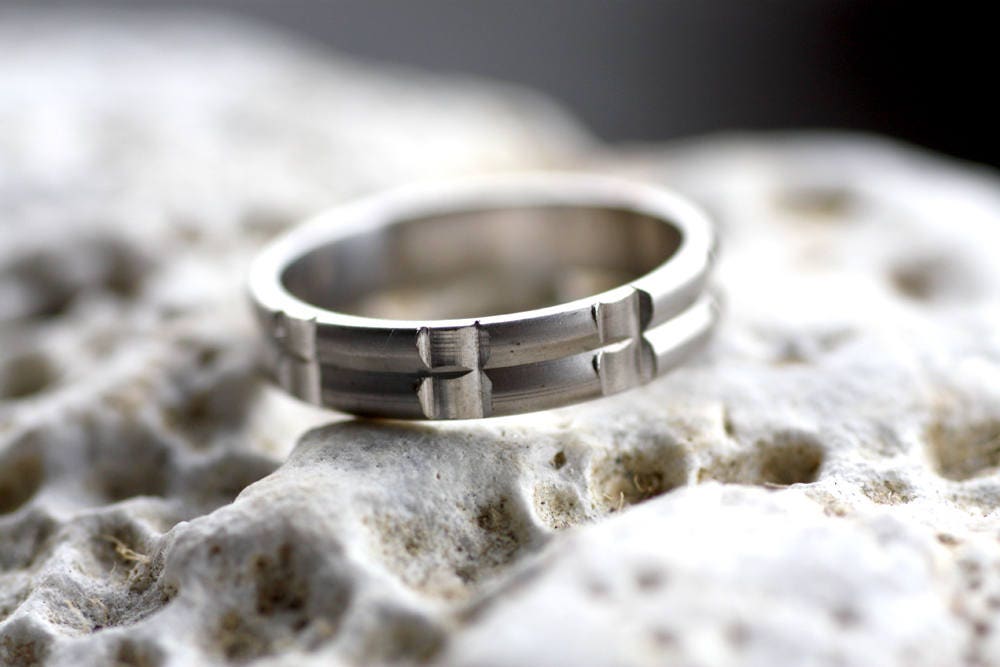 Solid gold or sterling silver wedding ring with simple lines