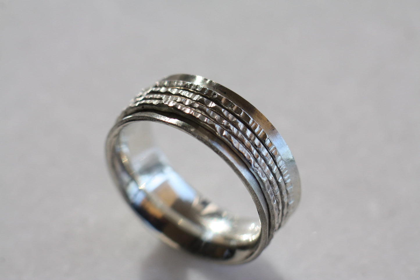 Engraved Handwriting Ring with 4 Spinners - Silver Relief Band for Men or Women