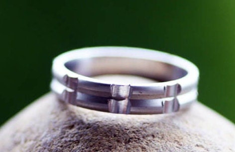 Solid gold or sterling silver wedding ring with simple lines