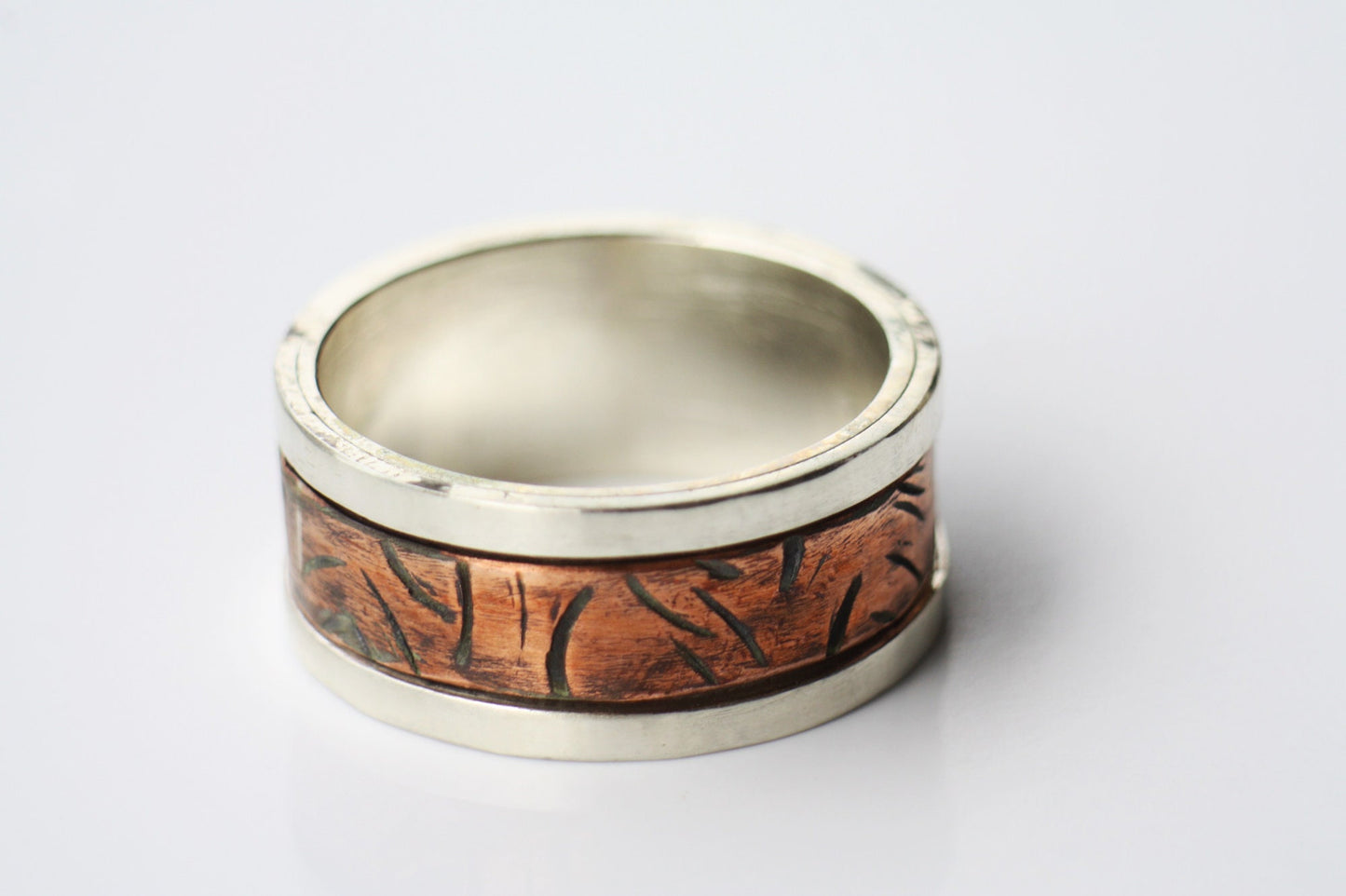 Spinner Sterling Silver with Copper ring