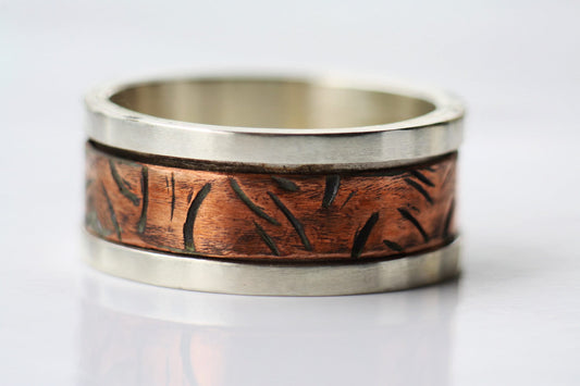 Copper and sterling silver spinner ring