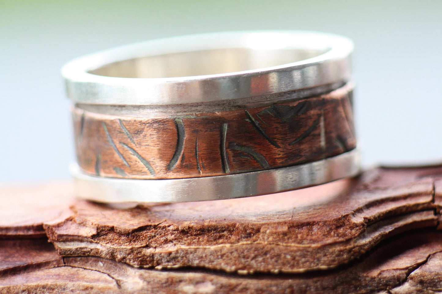 Spinner Sterling Silver with Copper ring