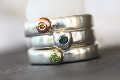 Minimal Stacking Rings with Tourmalines