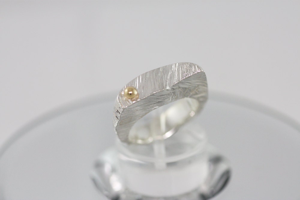 Custom made textured ring with yellow Sapphire and Gold K18